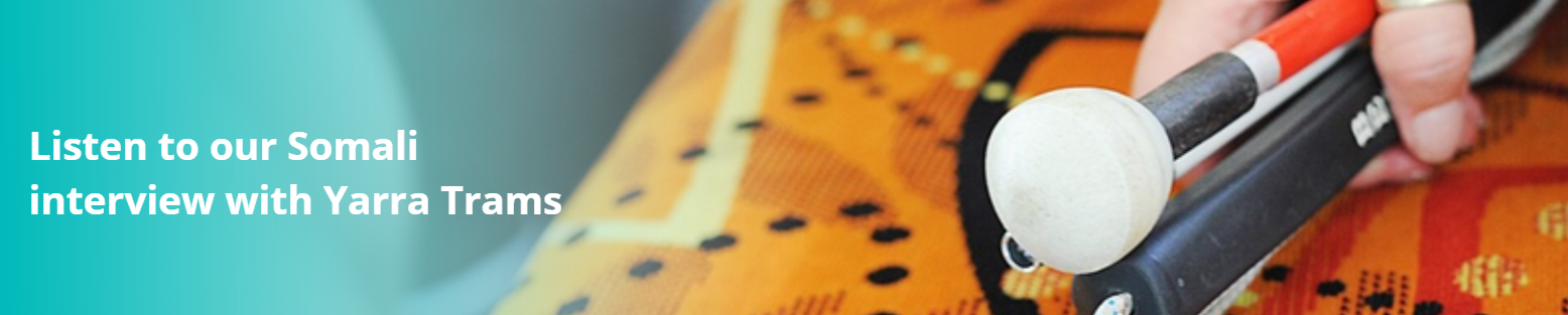 Close up image of white cane on a tram seat with text: Listen to our Somali Interview with Yarra Trains'